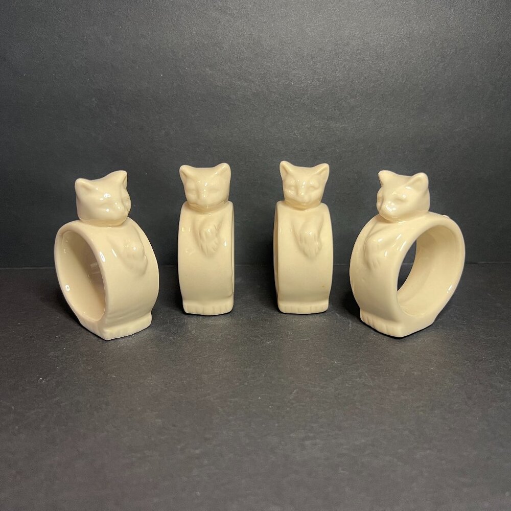Set of 4 Crowning Touch Ivory Colored Stoneware Ceramic Napkin Ring Holders